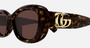 Gucci GG1829SK 002 oval sunglasses for women in full rim plastic, with black frame, and brown lenses. 53mm in lens size, 18mm in bridge size, and 145mm in temple length.