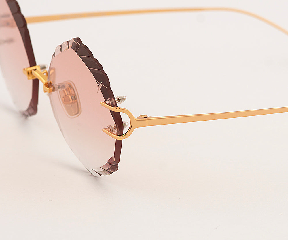 Eyepetizer Guadalupe C.4-61 irregular sunglasses for women in rimless steel, with gold frame, and orange gradient lenses. 56mm in lens size, 16mm in bridge size, and 145mm in temple length.