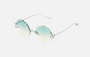 Eyepetizer Guadalupe C.1-59 irregular sunglasses for women in rimless steel, with silver frame, and gradient aqua green lenses. 56mm in lens size, 16mm in bridge size, and 145mm in temple length.
