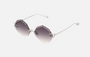 Eyepetizer Guadalupe C.1-60 irregular sunglasses for women in rimless steel, with silver frame, and grey gradient lenses. 56mm in lens size, 16mm in bridge size, and 145mm in temple length.