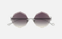 Eyepetizer Guadalupe C.1-60 irregular sunglasses for women in rimless steel, with silver frame, and grey gradient lenses. 56mm in lens size, 16mm in bridge size, and 145mm in temple length.