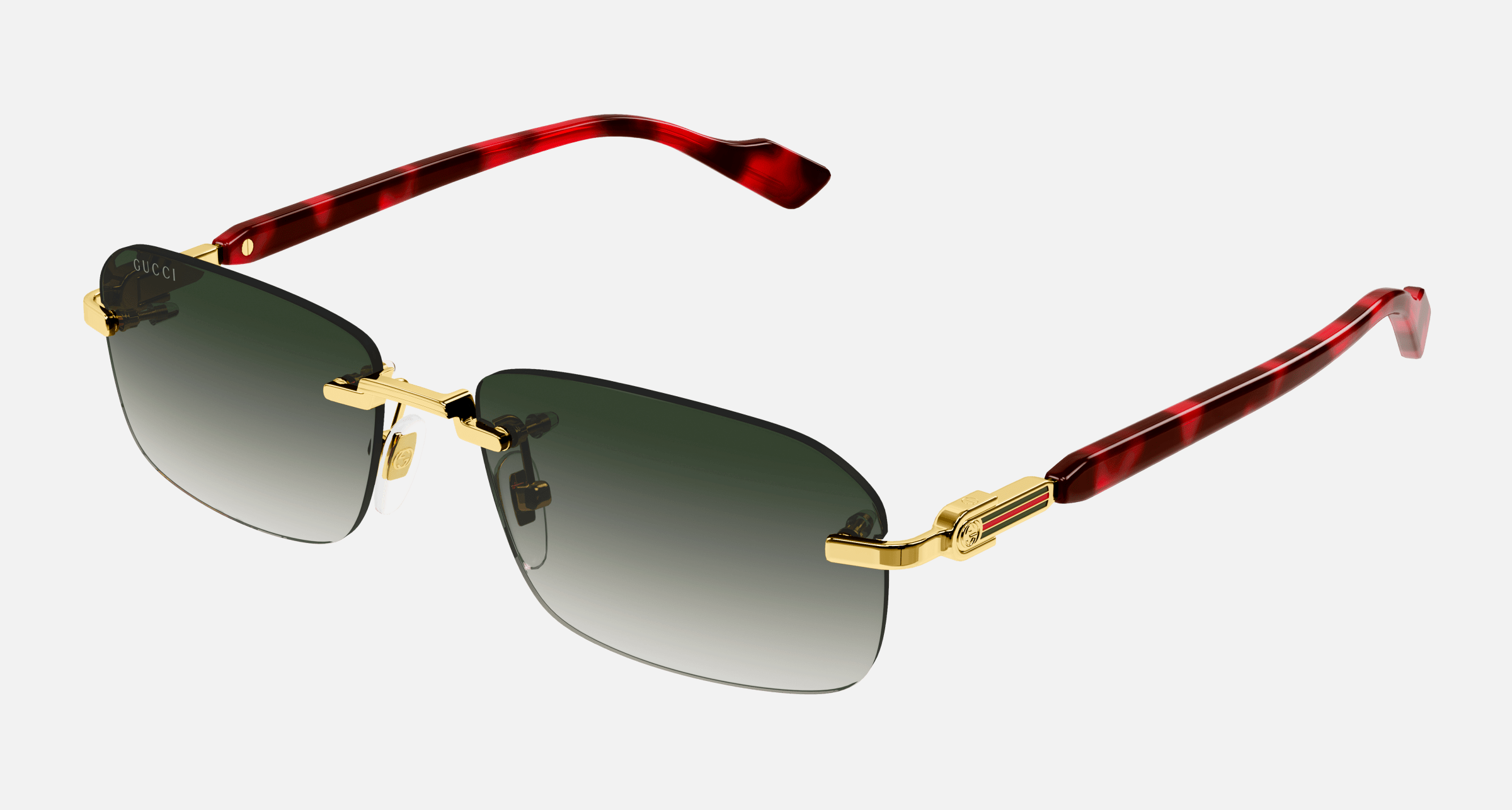 Gucci GG1221S 006 men's rimless rectangle sunglasses in a gold metal frame with grey gradient lenses. Features a 56 mm lens size, 16 mm bridge size, and 140 mm temple length. Available in Dubai, UAE.