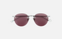 Eyepetizer Oxford C.1-55 round sunglasses for women in rimless steel, with silver frame, and lilac lenses. 51mm in lens size, 18mm in bridge size, and 145mm in temple length.