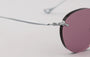 Eyepetizer Oxford C.1-55 round sunglasses for women in rimless steel, with silver frame, and lilac lenses. 51mm in lens size, 18mm in bridge size, and 145mm in temple length.
