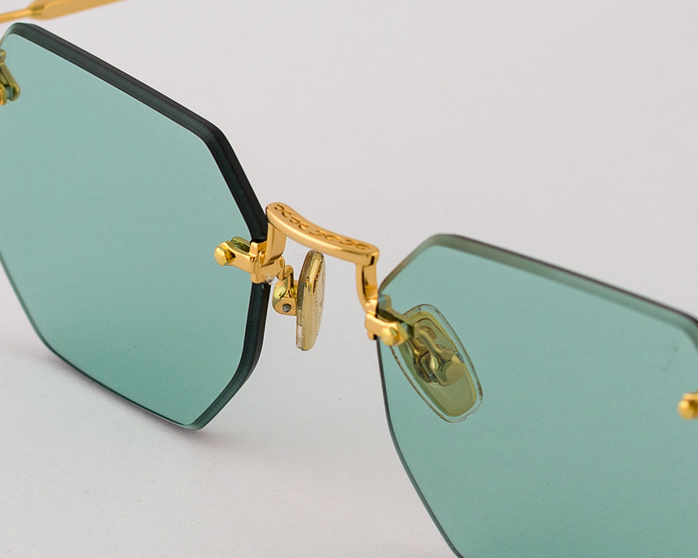 Eyepetizer Panthere C.4-48 irregular sunglasses for women in rimless steel, with gold frame, and aqua green lenses. 52mm in lens size, 18mm in bridge size, and 145mm in temple length.