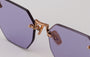 Eyepetizer Panthere C.9-49 irregular sunglasses for women in rimless steel, with rose gold frame, and violet lenses. 52mm in lens size, 18mm in bridge size, and 145mm in temple length.