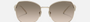 Prada PR 57YS ZVN3D0 irregular sunglasses for women in full rim metal, with pale gold frame, and light brown gradient lenses. 57mm in lens size, 18mm in bridge size, and 140mm in temple length.