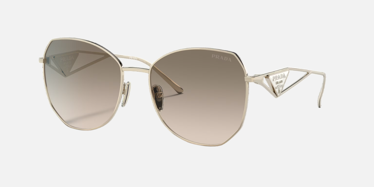 Prada PR 57YS ZVN3D0 irregular sunglasses for women in full rim metal, with pale gold frame, and light brown gradient lenses. 57mm in lens size, 18mm in bridge size, and 140mm in temple length.
