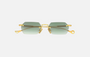 Eyepetizer Tank C.4-25 hexagonal sunglasses for women in rimless steel, with gold frame, and green gradient lenses. 52mm in lens size, 18mm in bridge size, and 145mm in temple length.