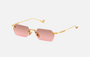 Eyepetizer Tank C.4-44 hexagonal sunglasses for women in rimless steel, with gold frame, and brown with pink gradient lenses. 52mm in lens size, 18mm in bridge size, and 145mm in temple length.