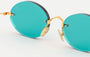 Eyepetizer Wilmot C.4-56 oval sunglasses for women in rimless steel, with gold frame, and aqua green lenses. 54mm in lens size, 18mm in bridge size, and 145mm in temple length.