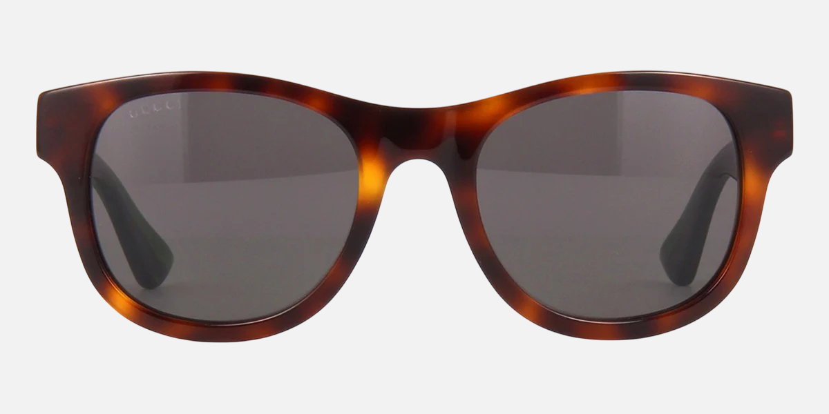 Gucci GG0003SN 003 square sunglasses for men in full rim acetate, with shiny havana frame, and grey lenses. 52mm in lens size, 21mm in bridge size, and 145mm in temple length.