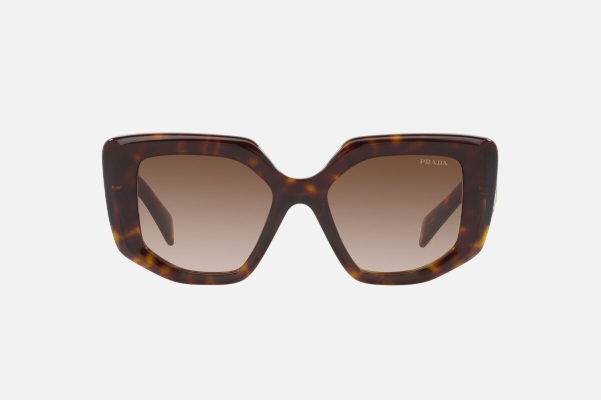 Prada PR 14ZS 2AU6S1 irregular sunglasses for women in full rim acetate, with havana frame, and brown gradient lenses. 50mm in lens size, 18mm in bridge size, and 140mm in temple length.