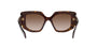 Prada PR 14ZS 2AU6S1 irregular sunglasses for women in full rim acetate, with havana frame, and brown gradient lenses. 50mm in lens size, 18mm in bridge size, and 140mm in temple length.