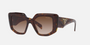 Prada PR 14ZS 2AU6S1 irregular sunglasses for women in full rim acetate, with havana frame, and brown gradient lenses. 50mm in lens size, 18mm in bridge size, and 140mm in temple length.