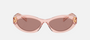 Prada PR 26ZS 19Q10D oval sunglasses for women in full rim acetate, with transparent peach frame, and light brown lenses. 55mm in lens size, 16mm in bridge size, and 145mm in temple length.