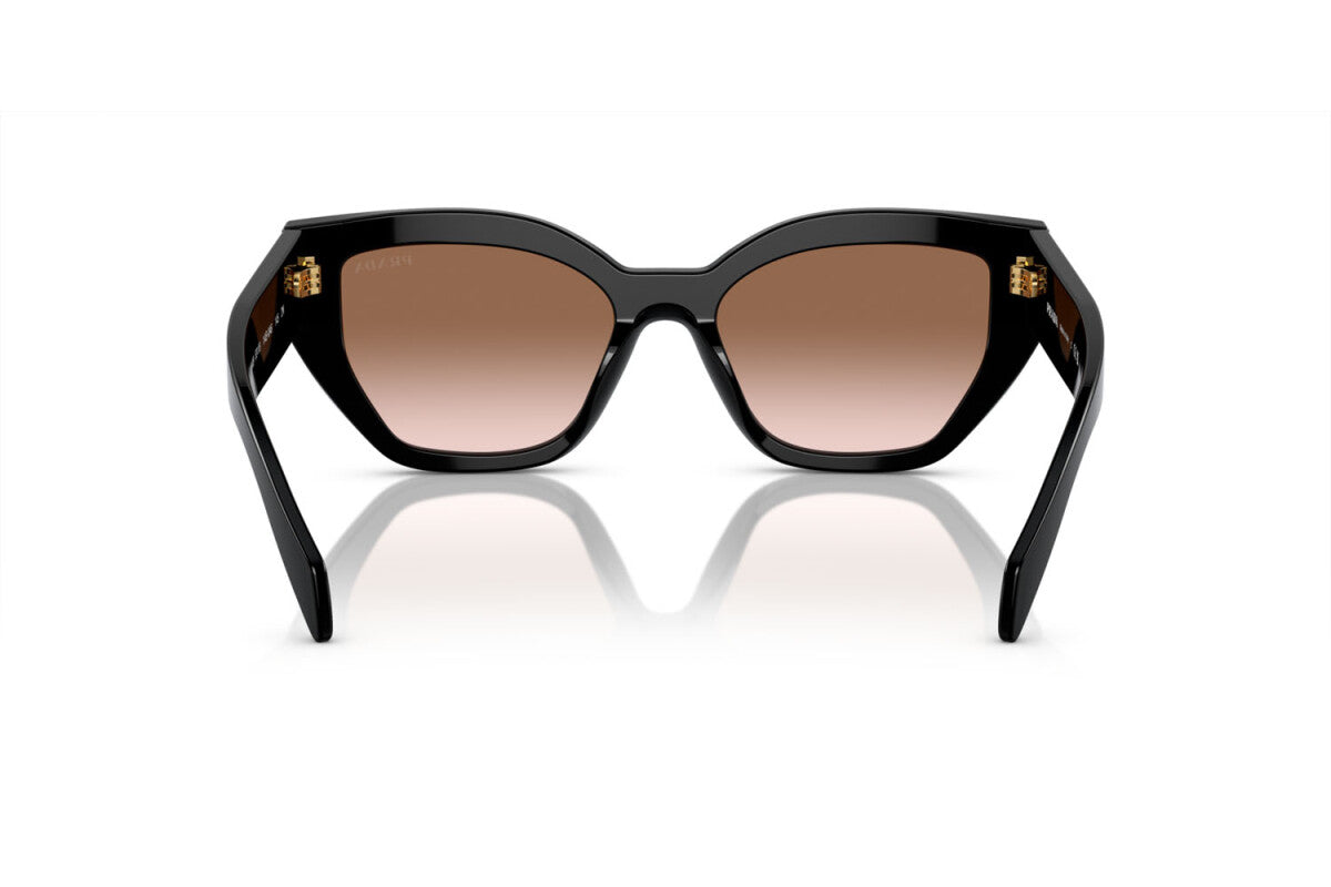 Prada PR A09S 1AB0A6 cat eye sunglasses for women in full rim acetate, with black frame, and brown gradient lenses. 53mm in lens size, 18mm in bridge size, and 145mm in temple length.