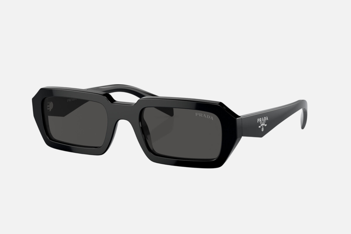 Prada PR A12S 16K08Z rectangular sunglasses for women in full rim acetate, with black frame, and dark grey lenses. 52mm in lens size, 21mm in bridge size, and 140mm in temple length.