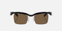 Prada PR A15S 1AB8C1 rectangular sunglasses for men in rimless nylon, with black frame, and dark brown lenses. 47mm in lens size, 20mm in bridge size, and 135mm in temple length.