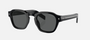 Prada PR A16S 16K731 round sunglasses for men in full rim acetate, with black frame, and dark grey lenses. 49mm in lens size, 24mm in bridge size, and 145mm in temple length.