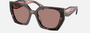 Prada PR 15WS 23A60B irregular sunglasses for women in full rim acetate, with havana frame, and light brown lenses. 54mm in lens size, 19mm in bridge size, and 140mm in temple length.