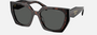 Prada PR 15WS 24B40L irregular sunglasses for women in full rim acetate, with dark havana frame, and dark grey lenses. 54mm in lens size, 19mm in bridge size, and 140mm in temple length.